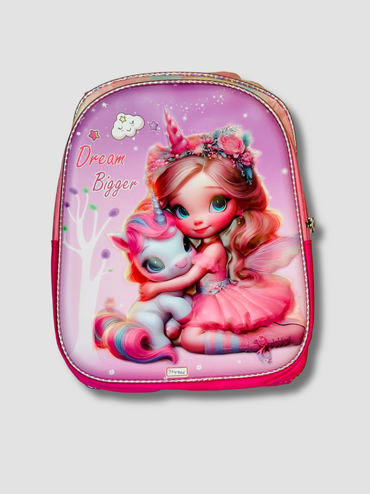Front view of pink kids backpack featuring 3D fairy girl and unicorn with 'Dream Bigger' text