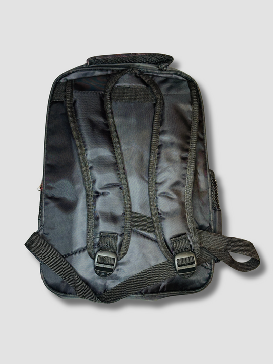 Rear view of Batman-themed backpack showing padded black straps and breathable back panel