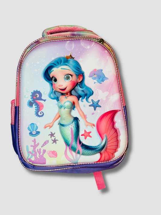 Front view of a mermaid-themed kids backpack featuring a colorful 3D cartoon mermaid, sea creatures, and ocean elements on a pink and purple background